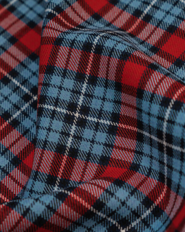 Spirit of Le Mans (SOLM) "Retro Racing" tartan fabric was inspired by the Martini Racing livery.