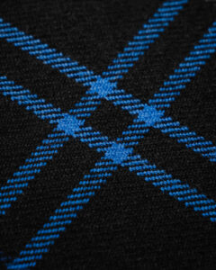Tartan dark blue with blue & white stripes.