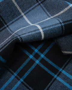 Tartan grey and blue with lighter blue stripe.