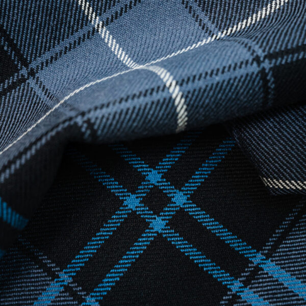 Tartan grey and blue with lighter blue stripe.