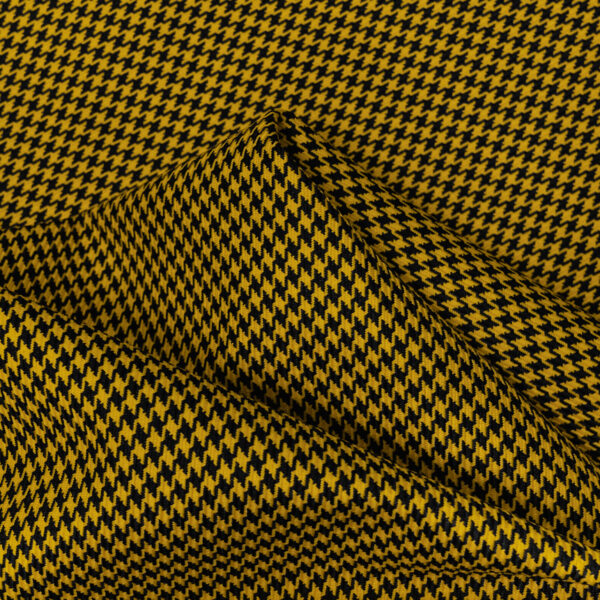 Houndstooth black and yellow fabric. Content: 100% Polyester.