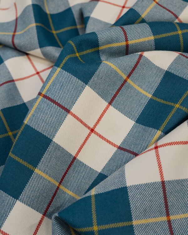 Tartan blue& white with red & yellow stripes.